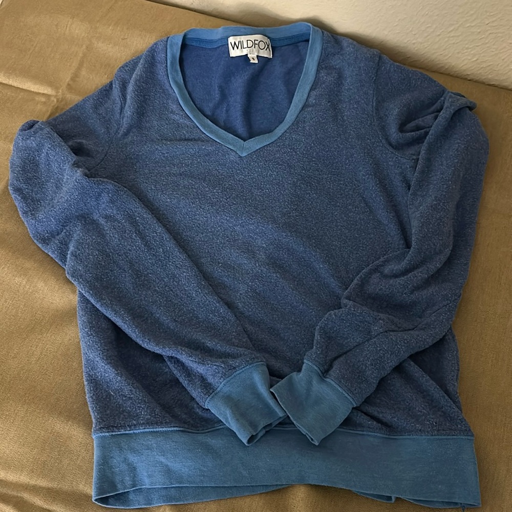 Wildfox V- neck sweatshirt that’s soft & springy. Lightweight feel but warm.